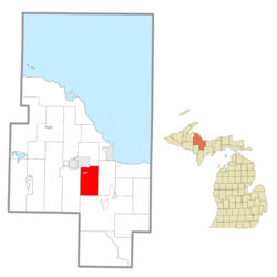 Location within Marquette County (red) and the administered community of Palmer (pink)