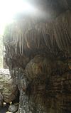 A stalagmite adorned the entrance of a cavern in Magsuhot Park