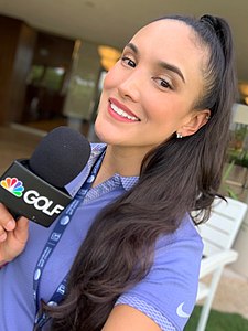 Carolina Romero interviewing players at the 2019 Mayakoba Golf Classic