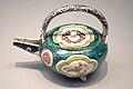 Ko-Kutani (old Kutani) five colours Iroe type sake ewer with bird and flower design in overglaze enamel, Edo period, 17th century