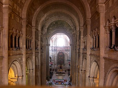 The cathedral's columns and arches supporting the barrel vault.