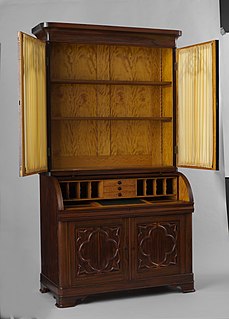 Secretary desk Base of drawers topped by a hinged desktop surface topped by a bookcase