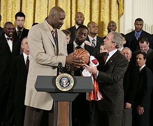 Miami Heat all-time roster - Shaquille O'Neal (left) and Dwyane Wade (center), along with the 2005–06 Miami Heat players and staff, presented United States President George W. Bush (right) with an autographed basketball at the Wh...