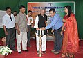 Shri Thangso Baite, MP Lok Sabha lighting the inaugural lamp of the Public Information Campaign, organised by the Press Information Bureau, Imphal, at B. Vengnuom Village, Churachandpur district, Manipur.jpg