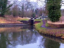 Stourton Junction: the Stourbridge Canal descends through locks to meet the Staffordshire and Worcestershire. StaffsWorcs Stourton Junction.jpg