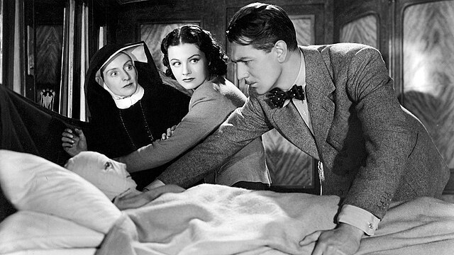 Catherine Lacey, Margaret Lockwood and Michael Redgrave in Alfred Hitchcock's The Lady Vanishes (1938)