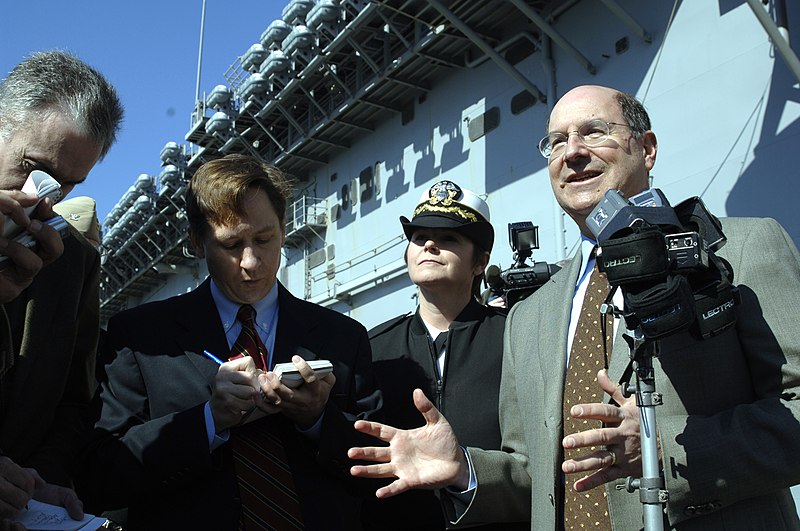 File:US Navy 060215-N-5275S-451 Secretary of the Navy (SECNAV), the Honorable Dr. Donald C. Winter addresses the press during an interview aboard the amphibious assault ship USS Iwo Jima (LHD 7).jpg