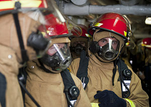 US Navy 120123-N-FI736-068 Sailors prepare for a general quarters training exercise aboard the aircraft carrier USS Enterprise (CVN 65).jpg