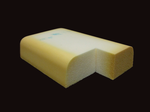 Polyurethane foam made with an aromatic isocyanate, which has been exposed to UV light. Readily apparent is the discoloration that occurs over time. UVDistressedFlexMoldedFoam800x600.png