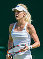 Urszula Radwańska competing in the first round of the 2015 Wimbledon Championships.