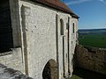 Français : Façade sud de la chapelle vue de l'ancien donjon arrasé, château de Villebois-Lavalette, Charente, France