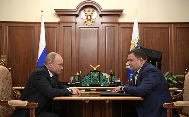Putin (left), with Petr Fradkov (right) in the Kremlin in May 2019