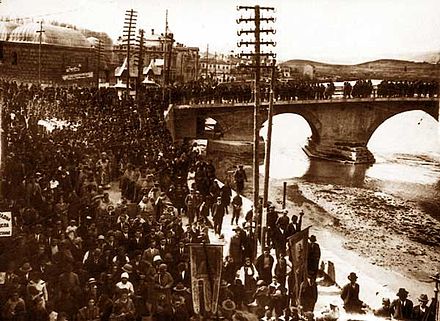 Epiphany procession in the capital of North Macedonia Skopje near Stone Bridge on the Vardar river in the early 1920s