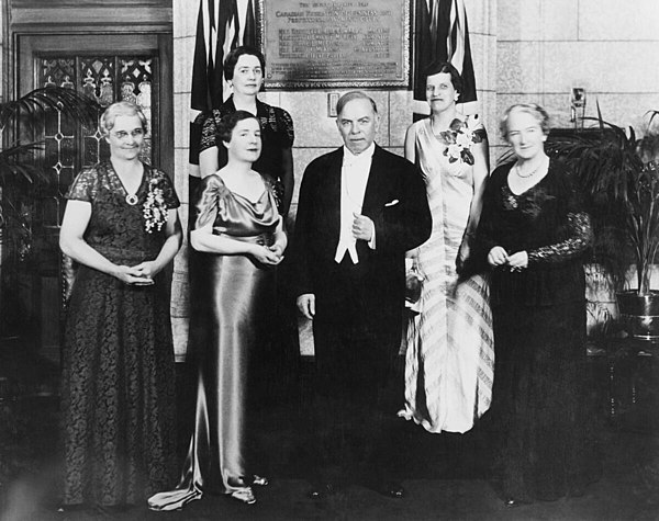 William Lyon Mackenzie King unveils a plaque commemorating the five Alberta women whose efforts resulted in the Persons Case. [Front, L-R]: Mrs. Muir 