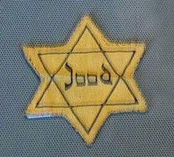Jews in Nazi-occupied Europe were required to wear yellow badges such as this.