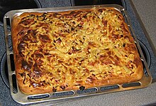 Zwiebelkuchen baked in a sheet pan