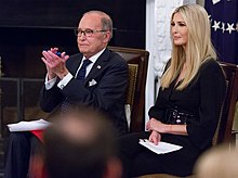 Kudlow with Ivanka Trump in 2018 "Our Pledge to America's Workers" (45604416292) (cropped).jpg