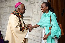 Archbishop Gregory greets parishioners after a Mass at St. Augustine Church in Washington, D.C. 060219 StAugustineMassGregory.jpg
