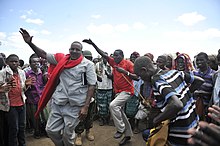 Residents of Tortoro celebrate with Lower Shabelle governor Abdulkadir Mohamed Sidi after the town's liberation from al-Shabaab, June 2015. 2015 06 22 Torotorow-6 (19078648775).jpg