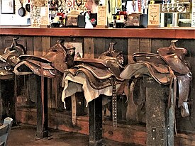 The bar in the Saloon has stools with saddles on them
