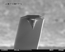 SEM image of a used AFM cantilever AFM (used) cantilever in Scanning Electron Microscope, magnification 1000x.GIF