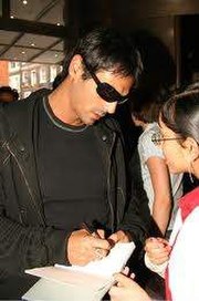 Rampal signing autographs at Temptation photocall held at the Washington Hotel in London