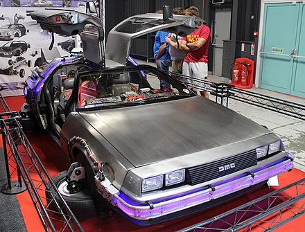 The time machine DeLorean of Back to the Future in flying configuration with doors open