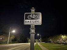 A bicycle lane along Racquet Club Road in February 2022. Bike Lane, Racquet Club Road, Weston, Florida February 24, 2022.jpg