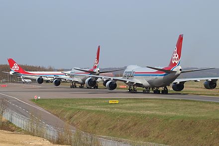 The Cargolux fleet of 747 jumbo jet freighters dominate all other aircraft at Findel