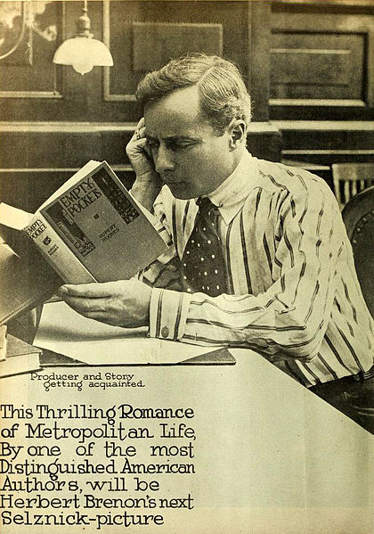 Brenon in 1917 reading Rupert Hughes' Empty Pockets