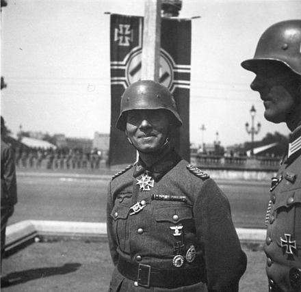 Rommel at a Paris victory parade (June 1940). Rommel had access to Reich Minister of Propaganda Joseph Goebbels via a senior propaganda official Karl Hanke, who served under Rommel during the 1940 campaign.[564]