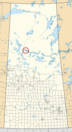 Saskatchewan vilayetinin 297 kırsal belediyesini ve yüzlerce küçük Kızılderili rezervini gösteren bir haritası. Biri kırmızı bir daire ile vurgulanmıştır.