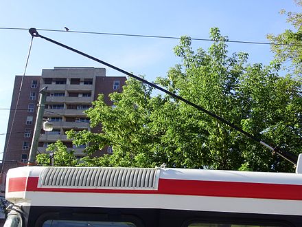Trolley pole on a Toronto streetcar, tipped with a trolley shoe