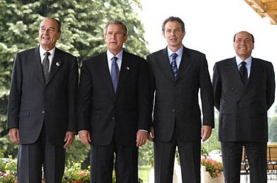 From the left: French President Jacques Chirac, US President George W. Bush, British Prime Minister Tony Blair and Italian Prime Minister Silvio Berlusconi. Chirac was against the invasion, the other three leaders were in favor. Chirac Bush Blair Berlusconi.jpg