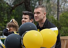Martin with captain Trent Cotchin during the 2017 AFL Grand Final parade Cotch and Dusty GFP17.jpg