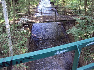 Bridge of the Vlčí Důl cycle path across Dobranovský potok near Dobranov