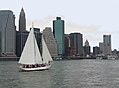 Sailboat on the East River in front of Manhattan - NY