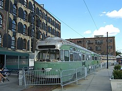 Old, out-of-service streetcars behind a Fairway Market (later become Food Bazaar) in Red Hook. FairwayRHCableCarByLuigiNovi3.jpg