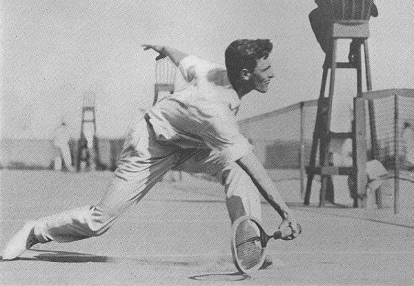 Alexander playing a low forehand volley