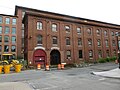 Hamilton Mill, located near 165 Jackson Street, Lowell, Massachusetts. West and south (front) sides of building shown.