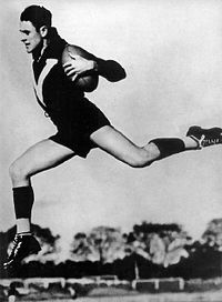 Haydn Bunton Sr, seen here representing Victoria (circa 1930), was the first of four three-time Brownlow Medal winners. This feat has not been replicated since Ian Stewart more than half a century ago. Haydn Bunton Snr leap.jpg