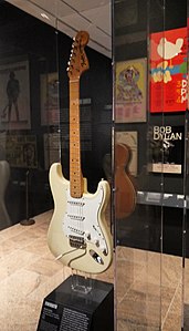 Jimi Hendrix's Fender Stratocaster (1968) in Olympic White, purchased in New York in 1968, played on legendary 1969 Woodstock performance, and used until about 1970 - Play It Loud. MET (2019-05-13 19.43.28 by Eden, Janine and Jim).jpg