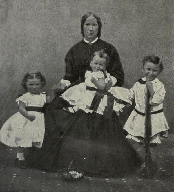Kitchener on his mother's lap, with his brother and sister