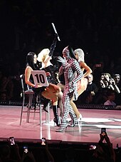 Lourdes and Madonna (on the chairs) during the Celebration Tour in London, 2023 Madonna (53264914905).jpg