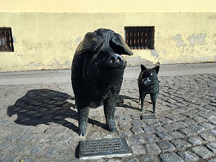 A monument in Sremska Mitrovica dedicated to local breeds of pig and dog