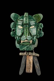 Mosaic mask that represents a Bat god, 25 pieces of jade, with yellow eyes made of shell. It was found in a tomb at Monte Albán