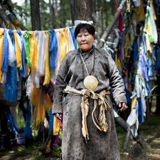 Tsaatan shaman wearing a toli
hanging from her neck; Khovsgol Province, Mongolia Mongolian 087 cropped.png