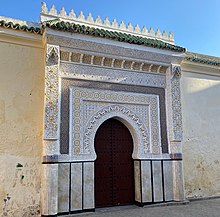 Separate entrance doorway to the necropolis on the Mosque's southern side Morocco Fes MosqueAbdallah.jpg