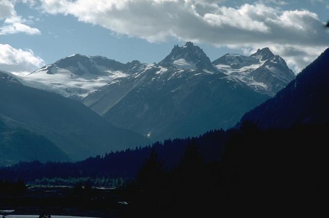 The Mount Meager massif in 1987. Summits left to right are Capricorn Mountain, Mount Meager and Plinth Peak.