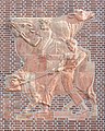 Deutsch: Rindermarkthalle in Hamburg-St. Pauli, Relief am westlichen Treppenhaus. This is a photograph of an architectural monument. It is on the list of cultural monuments of Hamburg, no. 13328.